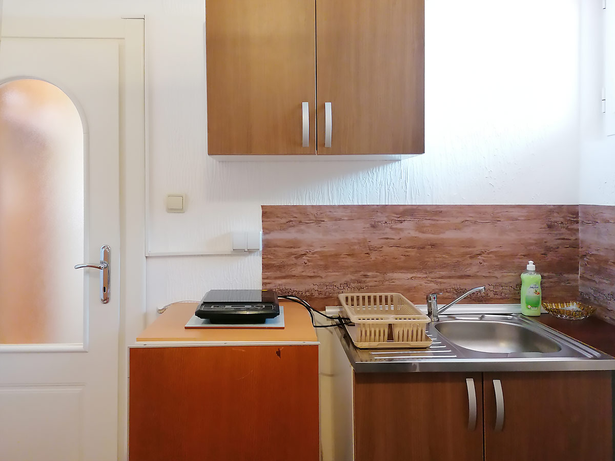 Apartman Hram 2 A 10 - Kuhinja, šporet, indukciona ploča